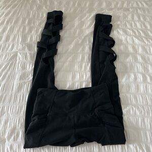 Athleta Chaturanga Black Criss Cross Lace Up Side Pockets Cut Out Leggings